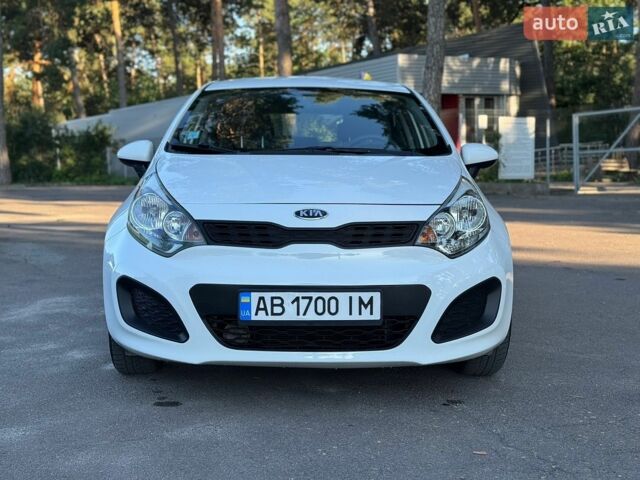 Білий Кіа Ріо, об'ємом двигуна 1.25 л та пробігом 128 тис. км за 6500 $, фото 1 на Automoto.ua