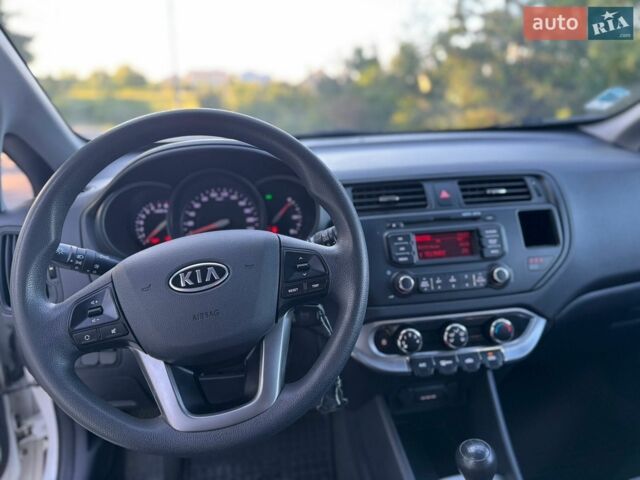 Білий Кіа Ріо, об'ємом двигуна 1.25 л та пробігом 128 тис. км за 6500 $, фото 11 на Automoto.ua