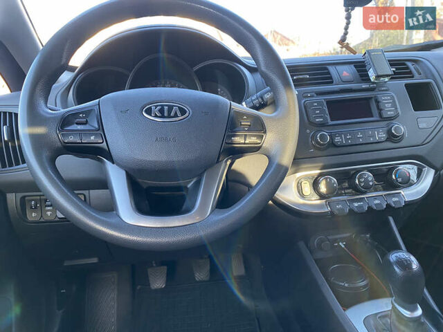 Білий Кіа Ріо, об'ємом двигуна 1.1 л та пробігом 204 тис. км за 6800 $, фото 24 на Automoto.ua