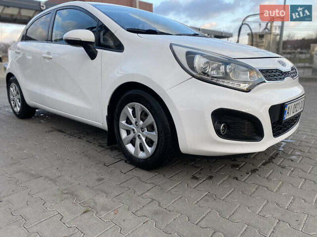 Білий Кіа Ріо, об'ємом двигуна 1.1 л та пробігом 204 тис. км за 6800 $, фото 7 на Automoto.ua