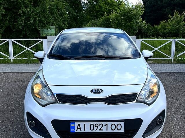 Білий Кіа Ріо, об'ємом двигуна 1.1 л та пробігом 212 тис. км за 5800 $, фото 7 на Automoto.ua