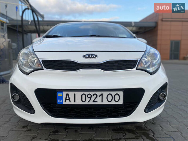 Білий Кіа Ріо, об'ємом двигуна 1.1 л та пробігом 204 тис. км за 6800 $, фото 10 на Automoto.ua