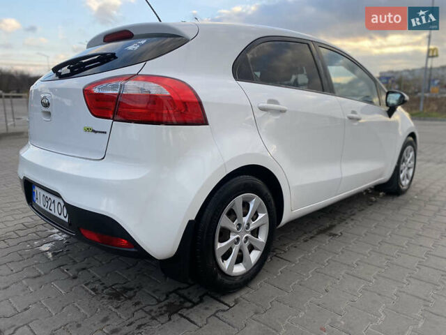 Білий Кіа Ріо, об'ємом двигуна 1.1 л та пробігом 204 тис. км за 6800 $, фото 5 на Automoto.ua