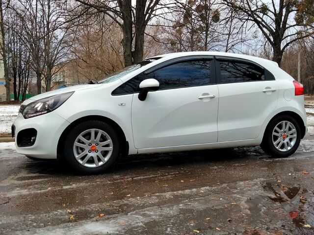 Білий Кіа Ріо, об'ємом двигуна 1.2 л та пробігом 169 тис. км за 6800 $, фото 4 на Automoto.ua