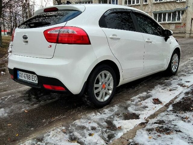 Білий Кіа Ріо, об'ємом двигуна 1.2 л та пробігом 169 тис. км за 6800 $, фото 2 на Automoto.ua