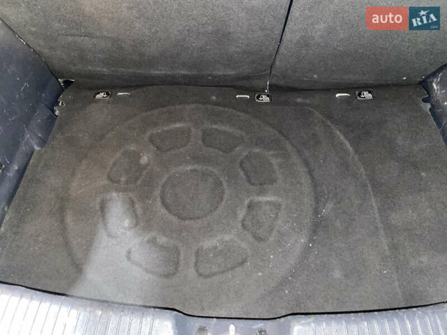 Білий Кіа Ріо, об'ємом двигуна 1.1 л та пробігом 204 тис. км за 6800 $, фото 14 на Automoto.ua