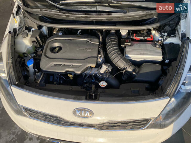 Білий Кіа Ріо, об'ємом двигуна 1.1 л та пробігом 204 тис. км за 6800 $, фото 30 на Automoto.ua