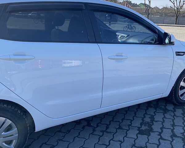 Білий Кіа Ріо, об'ємом двигуна 1.4 л та пробігом 101 тис. км за 7000 $, фото 7 на Automoto.ua