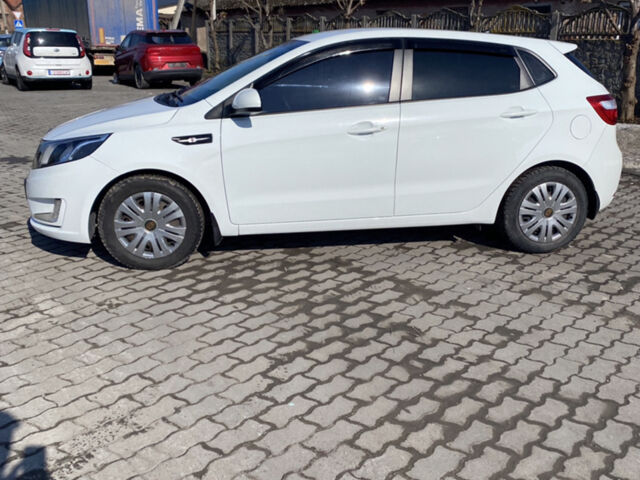 Білий Кіа Ріо, об'ємом двигуна 1.4 л та пробігом 103 тис. км за 6750 $, фото 1 на Automoto.ua