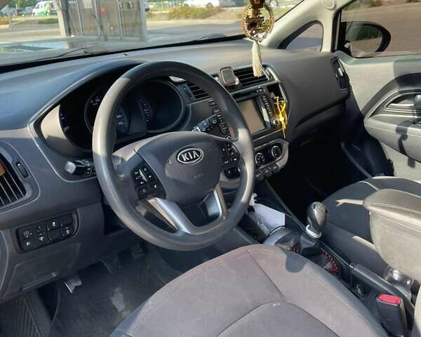 Білий Кіа Ріо, об'ємом двигуна 1.4 л та пробігом 247 тис. км за 8200 $, фото 10 на Automoto.ua