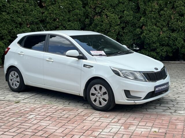 Белый Киа Рио, объемом двигателя 1.4 л и пробегом 279 тыс. км за 7000 $, фото 1 на Automoto.ua