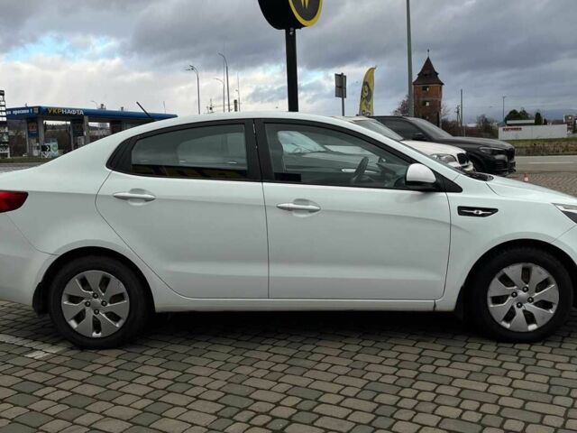 Білий Кіа Ріо, об'ємом двигуна 1.4 л та пробігом 200 тис. км за 6900 $, фото 7 на Automoto.ua