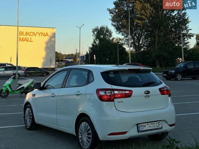 Білий Кіа Ріо, об'ємом двигуна 1.4 л та пробігом 330 тис. км за 3800 $, фото 5 на Automoto.ua