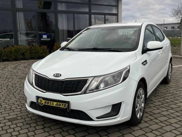 Білий Кіа Ріо, об'ємом двигуна 1.4 л та пробігом 200 тис. км за 6900 $, фото 2 на Automoto.ua
