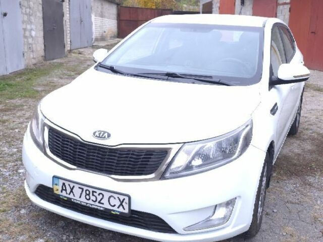 Білий Кіа Ріо, об'ємом двигуна 1.59 л та пробігом 296 тис. км за 5500 $, фото 8 на Automoto.ua