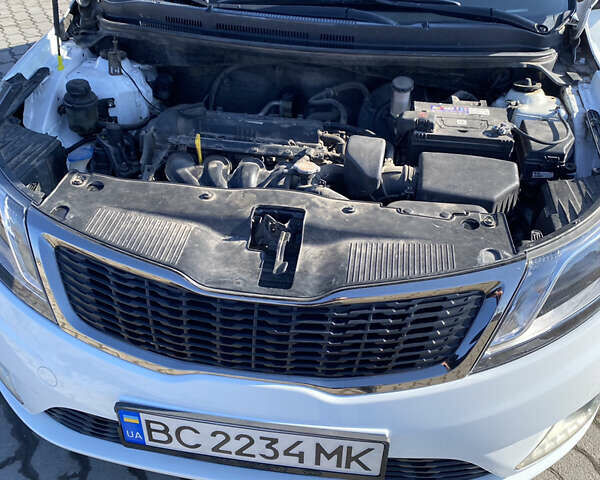 Білий Кіа Ріо, об'ємом двигуна 1.4 л та пробігом 101 тис. км за 7000 $, фото 15 на Automoto.ua