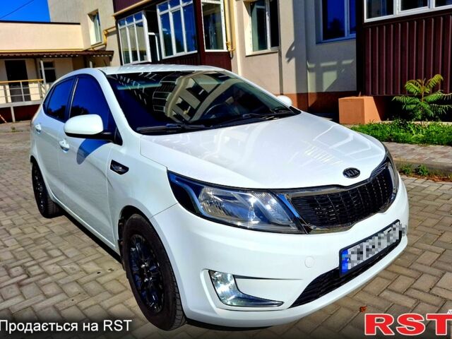 Білий Кіа Ріо, об'ємом двигуна 1.6 л та пробігом 185 тис. км за 7899 $, фото 1 на Automoto.ua