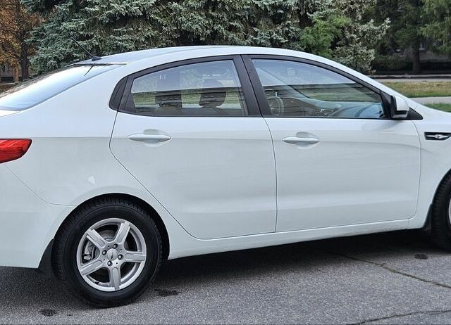 Белый Киа Рио, объемом двигателя 1.4 л и пробегом 105 тыс. км за 6300 $, фото 5 на Automoto.ua