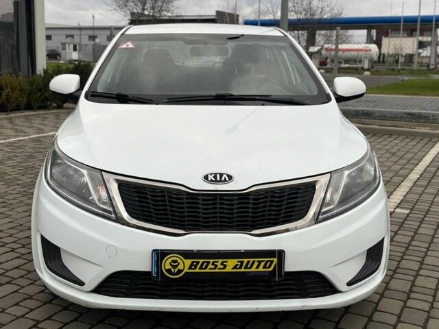 Білий Кіа Ріо, об'ємом двигуна 1.4 л та пробігом 200 тис. км за 6900 $, фото 1 на Automoto.ua