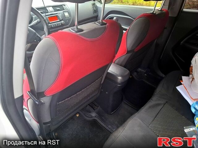Белый Киа Рио, объемом двигателя 1.1 л и пробегом 155 тыс. км за 6200 $, фото 6 на Automoto.ua