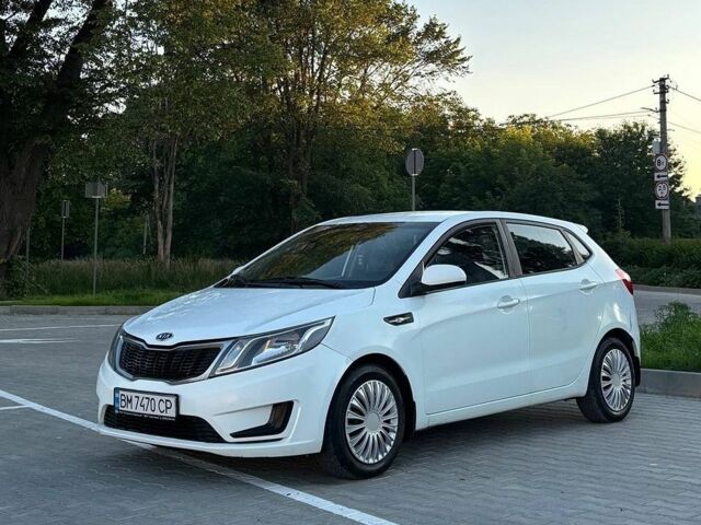 Білий Кіа Ріо, об'ємом двигуна 1.4 л та пробігом 330 тис. км за 3800 $, фото 7 на Automoto.ua