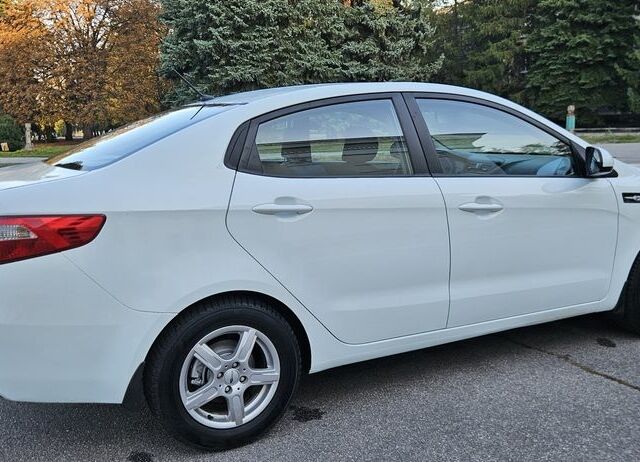 Белый Киа Рио, объемом двигателя 1.4 л и пробегом 105 тыс. км за 6300 $, фото 7 на Automoto.ua