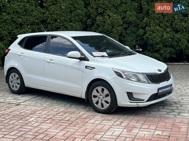 Білий Кіа Ріо, об'ємом двигуна 1.4 л та пробігом 279 тис. км за 7200 $, фото 1 на Automoto.ua