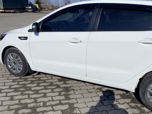 Білий Кіа Ріо, об'ємом двигуна 1.4 л та пробігом 103 тис. км за 6750 $, фото 4 на Automoto.ua