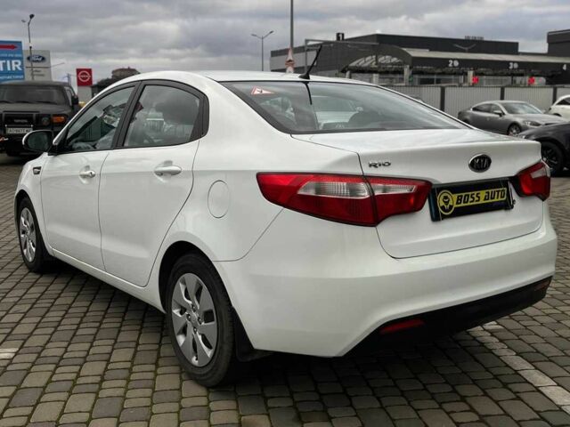 Білий Кіа Ріо, об'ємом двигуна 1.4 л та пробігом 200 тис. км за 6900 $, фото 4 на Automoto.ua