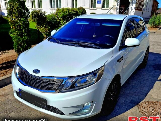 Білий Кіа Ріо, об'ємом двигуна 1.6 л та пробігом 185 тис. км за 7899 $, фото 6 на Automoto.ua