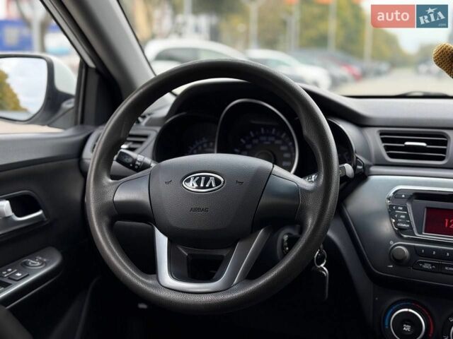 Білий Кіа Ріо, об'ємом двигуна 1.6 л та пробігом 99 тис. км за 8700 $, фото 9 на Automoto.ua