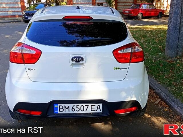 Білий Кіа Ріо, об'ємом двигуна 1.1 л та пробігом 250 тис. км за 4850 $, фото 3 на Automoto.ua