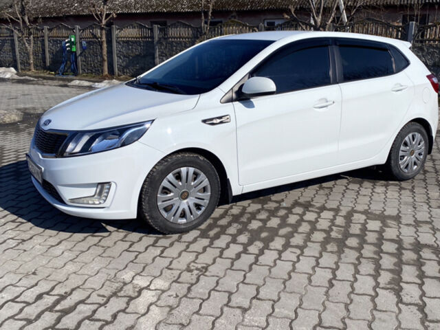 Білий Кіа Ріо, об'ємом двигуна 1.4 л та пробігом 103 тис. км за 6750 $, фото 2 на Automoto.ua