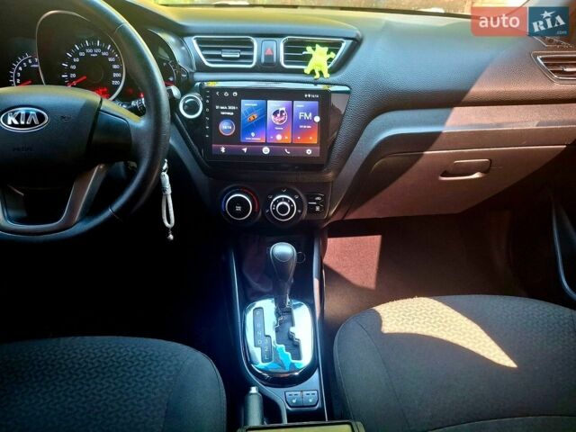 Білий Кіа Ріо, об'ємом двигуна 1.6 л та пробігом 185 тис. км за 7899 $, фото 13 на Automoto.ua