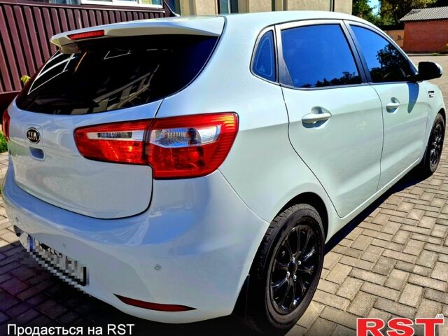 Білий Кіа Ріо, об'ємом двигуна 1.6 л та пробігом 185 тис. км за 7899 $, фото 3 на Automoto.ua