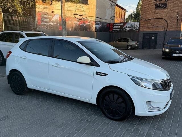 Білий Кіа Ріо, об'ємом двигуна 1.59 л та пробігом 168 тис. км за 7400 $, фото 1 на Automoto.ua