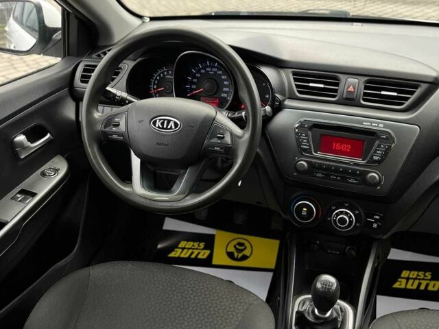 Білий Кіа Ріо, об'ємом двигуна 1.4 л та пробігом 200 тис. км за 6900 $, фото 11 на Automoto.ua