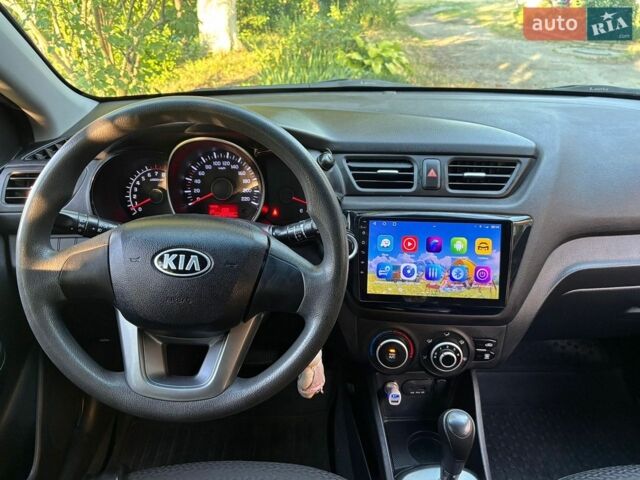 Белый Киа Рио, объемом двигателя 1.6 л и пробегом 239 тыс. км за 7900 $, фото 1 на Automoto.ua