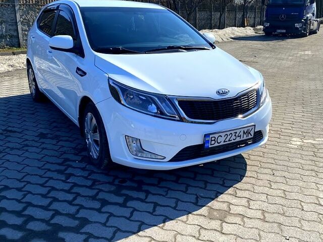 Белый Киа Рио, объемом двигателя 1.4 л и пробегом 102 тыс. км за 6850 $, фото 2 на Automoto.ua