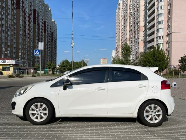 Білий Кіа Ріо, об'ємом двигуна 1.4 л та пробігом 247 тис. км за 8200 $, фото 9 на Automoto.ua