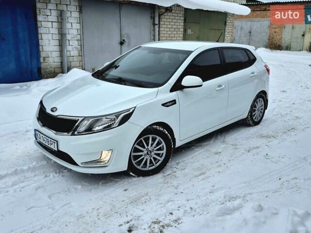Білий Кіа Ріо, об'ємом двигуна 1.4 л та пробігом 132 тис. км за 8800 $, фото 70 на Automoto.ua