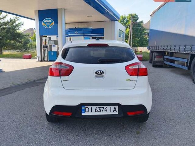 Белый Киа Рио, объемом двигателя 1.4 л и пробегом 282 тыс. км за 7799 $, фото 3 на Automoto.ua