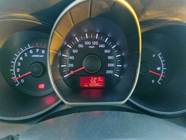 Білий Кіа Ріо, об'ємом двигуна 1.4 л та пробігом 160 тис. км за 8500 $, фото 8 на Automoto.ua