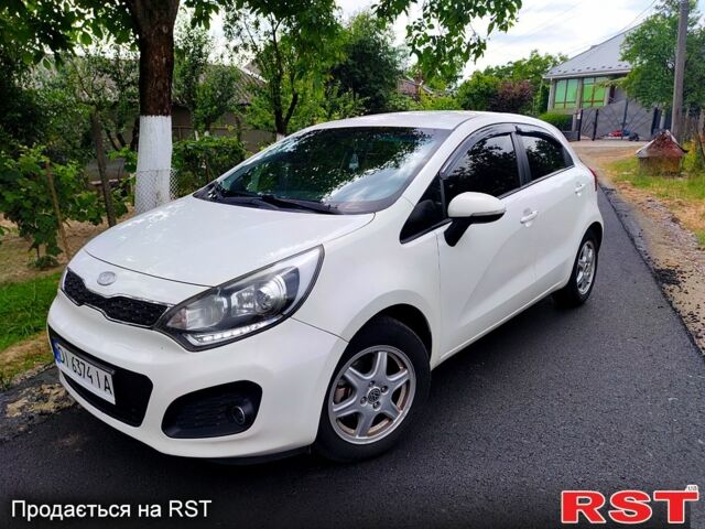 Белый Киа Рио, объемом двигателя 1.4 л и пробегом 282 тыс. км за 6999 $, фото 1 на Automoto.ua