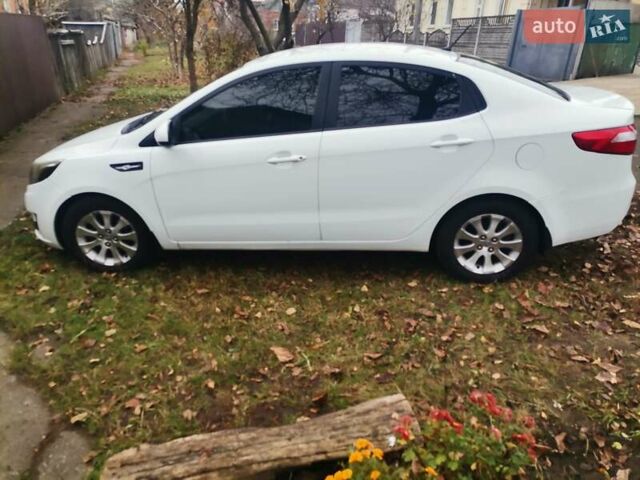 Белый Киа Рио, объемом двигателя 1.4 л и пробегом 159 тыс. км за 7400 $, фото 1 на Automoto.ua