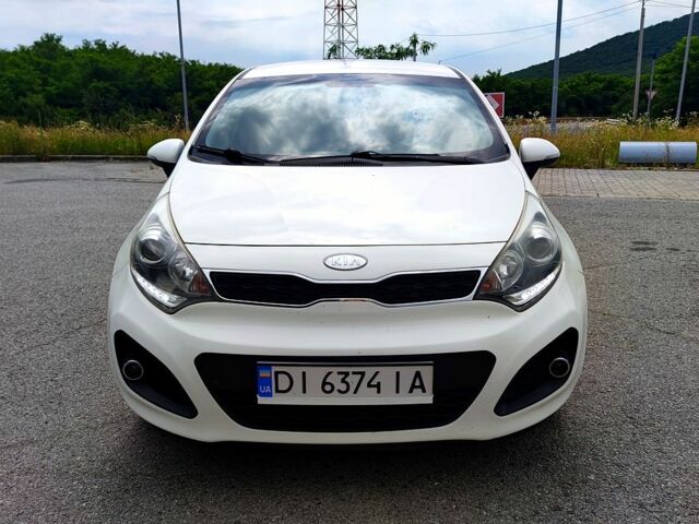 Белый Киа Рио, объемом двигателя 1.4 л и пробегом 282 тыс. км за 6999 $, фото 4 на Automoto.ua