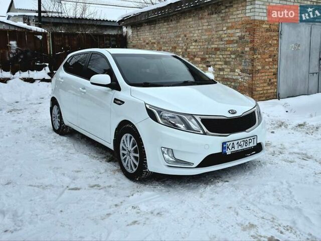 Білий Кіа Ріо, об'ємом двигуна 1.4 л та пробігом 132 тис. км за 8800 $, фото 6 на Automoto.ua
