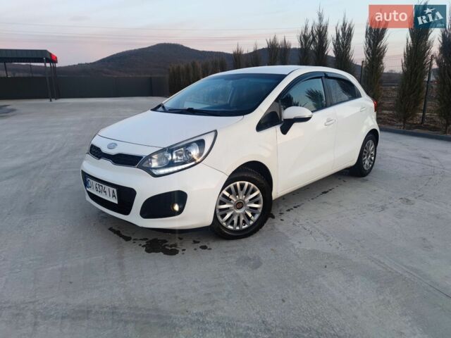 Белый Киа Рио, объемом двигателя 1.4 л и пробегом 299 тыс. км за 7200 $, фото 4 на Automoto.ua