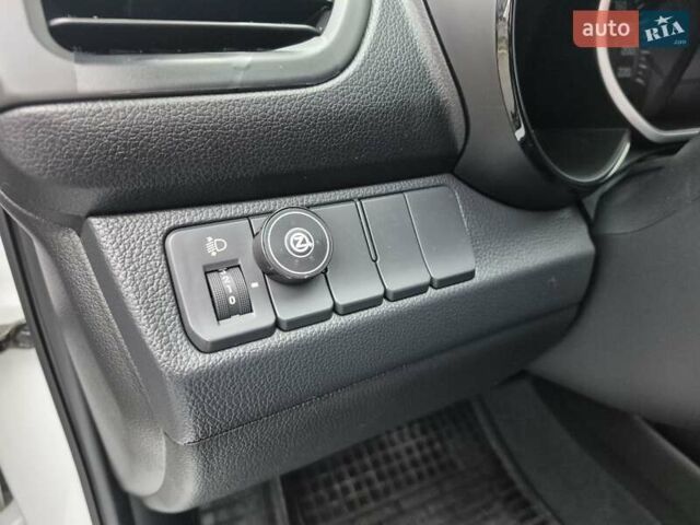 Білий Кіа Ріо, об'ємом двигуна 1.4 л та пробігом 132 тис. км за 8800 $, фото 25 на Automoto.ua