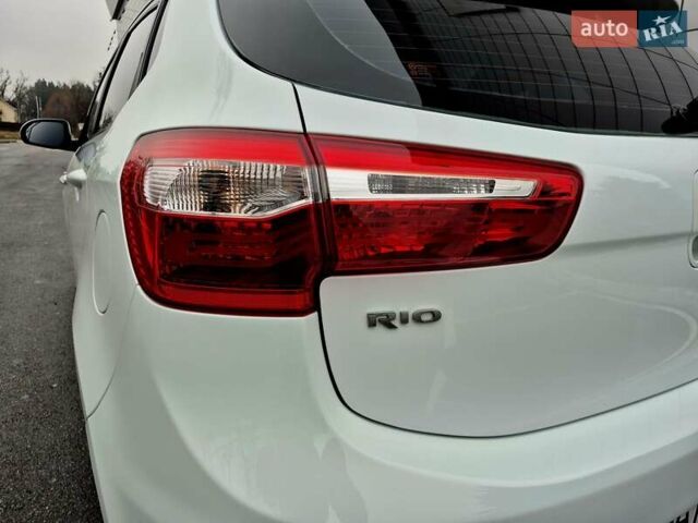 Білий Кіа Ріо, об'ємом двигуна 1.4 л та пробігом 132 тис. км за 8800 $, фото 14 на Automoto.ua